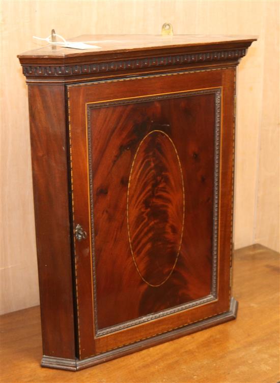 A small Edwardian inlaid mahogany hanging corner cupboard W.46cm